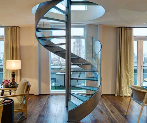 Custom Spiral Staircase: Elegant, Space-Saving Design - Penthouse Apartment With Custom Spiral Staircase