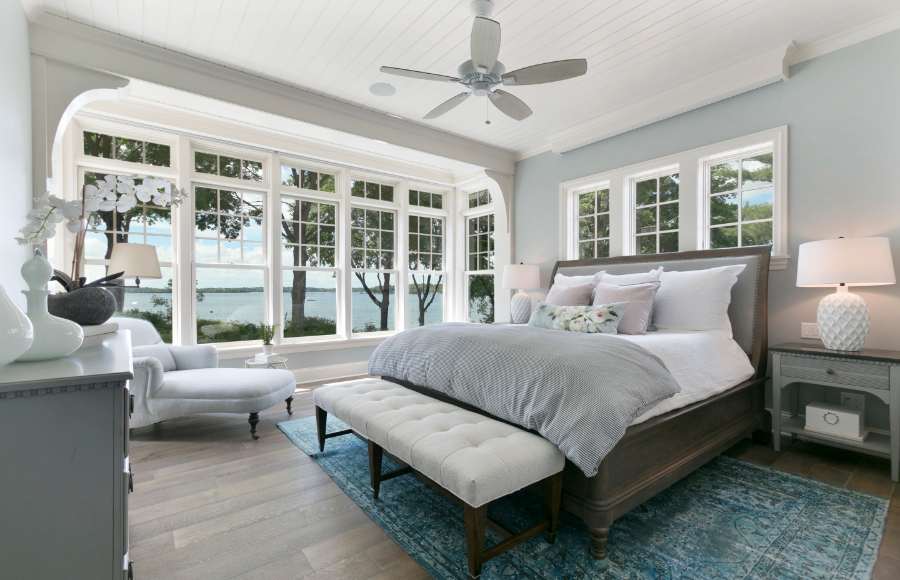Beautiful bedroom windows and ceiling fan