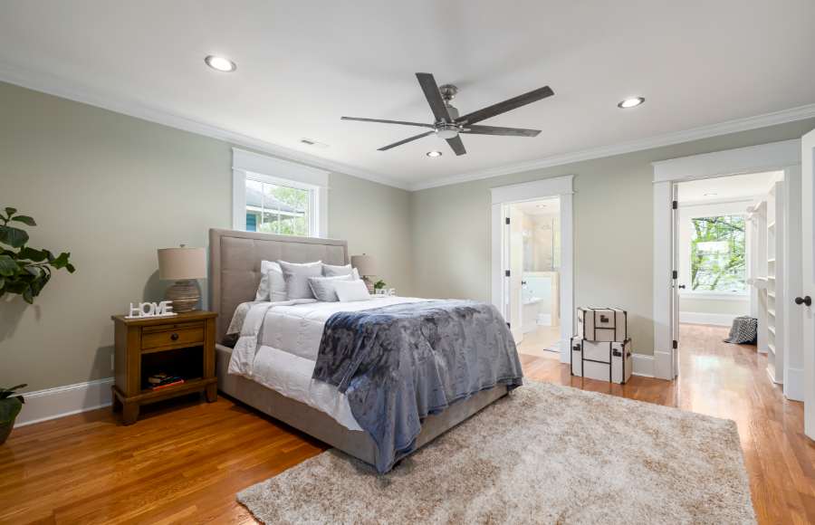 Ceiling Fan above a Bed