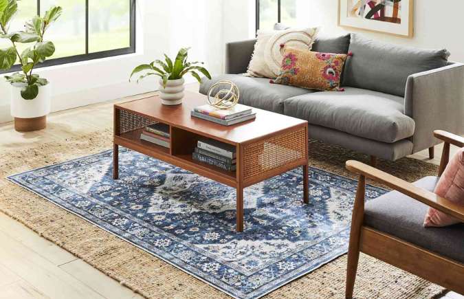 layered rugs boho living room design