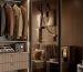 luxury mirrored closet door with a slim black frame and wood closet in bedroom